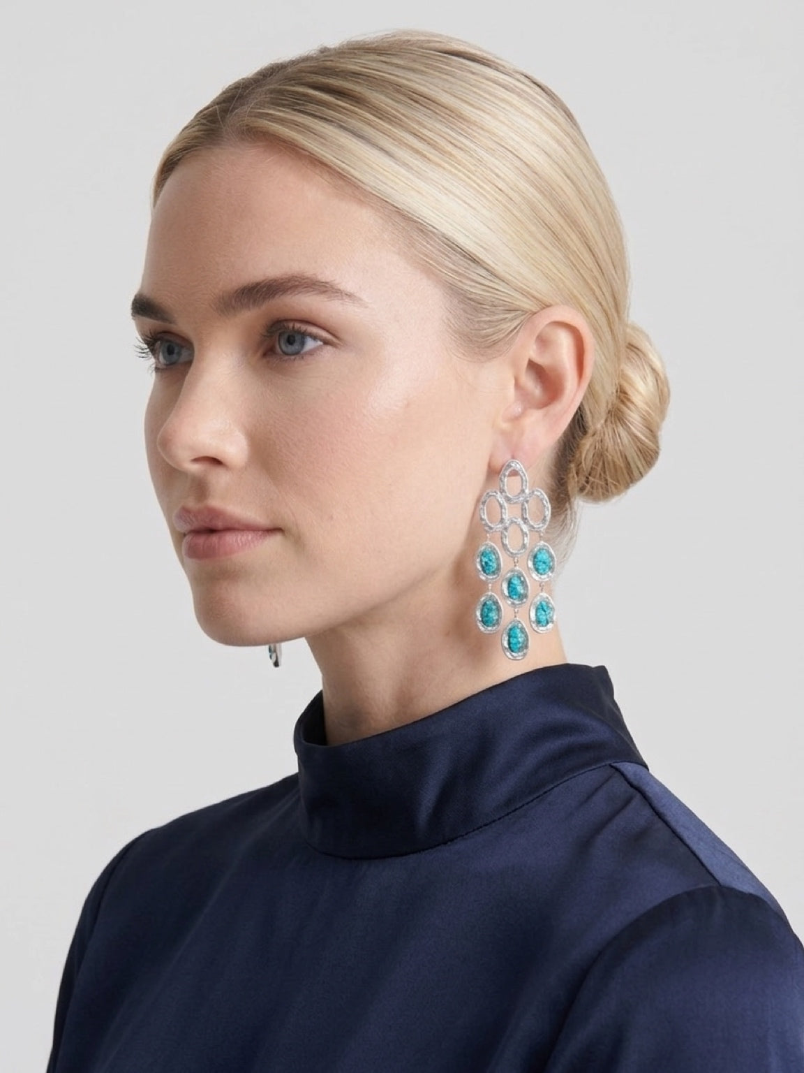 Ocean blue multi-drop earrings in stainless steel worn by model
