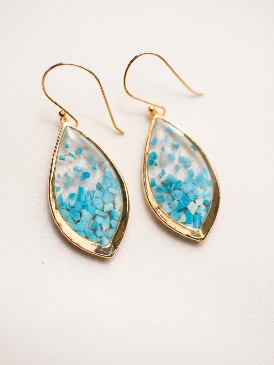 Turquoise chip teardrop earrings with gold plated finish